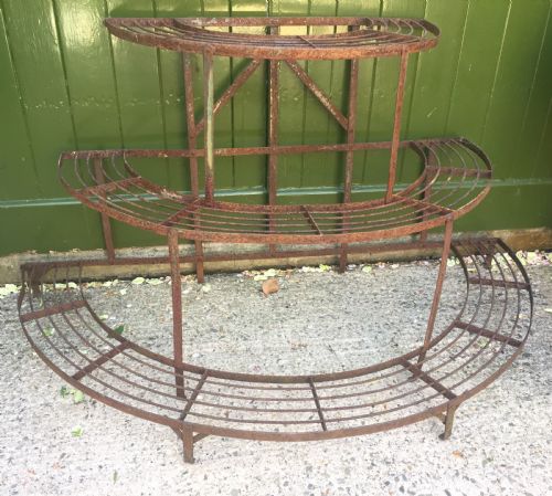 Late C19th/ Early C20th Slatted Wrought-iron Conservatory, Orangery or Garden Plant Stand of Semi-circular Graduated  Form.