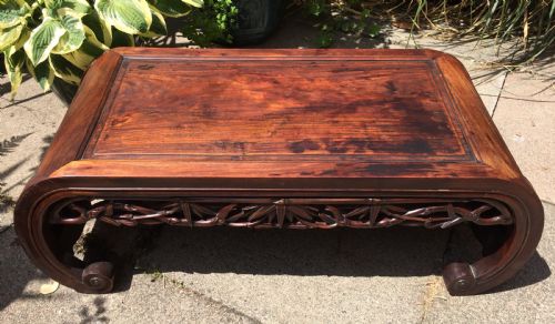 fig 1. Late C19th Chinese Qing Dynasty carved hardwood 'kang' or opium table of scroll-end design.