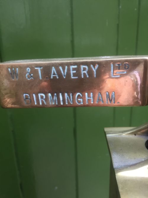 fig 3. A set of late Victorian or Edwardian oak and brass floor-standing scales by W. & T. Avery Ltd. , Birmingham.