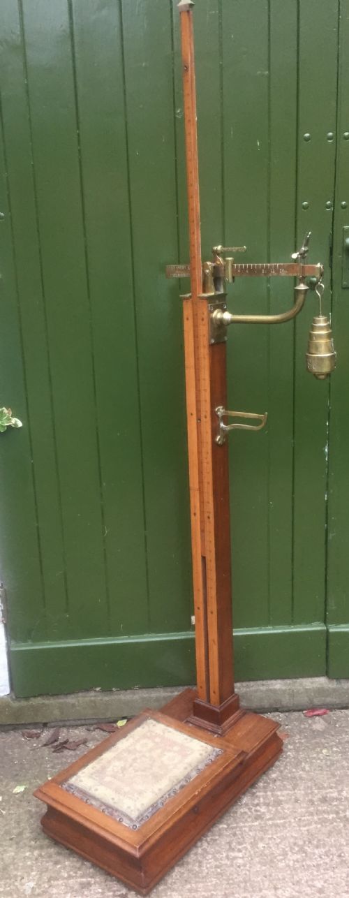A Set of Late Victorian or Edwardian Oak and Brass Floor-standing Scales by W. & T. Avery Ltd. , Birmingham.