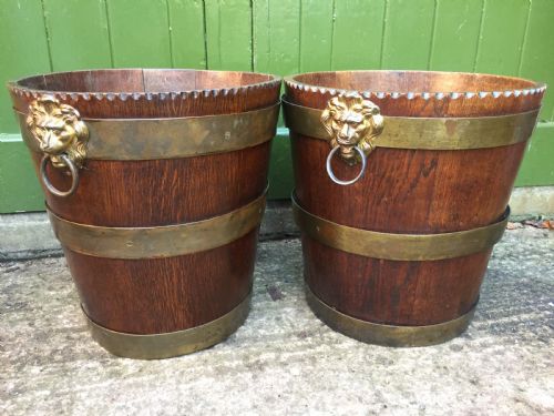 fig 1. Pair of early C19th brass-bound oak log or peat fireside buckets fitted with brass lions-mask ring handles .