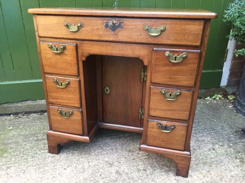 fig 1. C18th George II period mahogany knee-hole desk of small proportions.