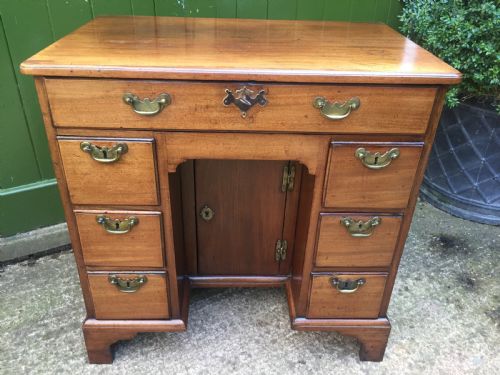 fig 2. C18th George II period mahogany knee-hole desk of small proportions.