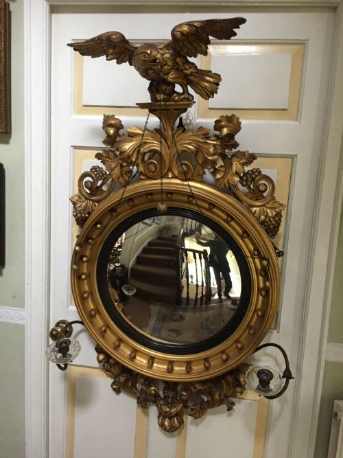 fig 3. Large and impressive Regency period carved gilt-wood frame girandole convex mirror with eagle surmount.
