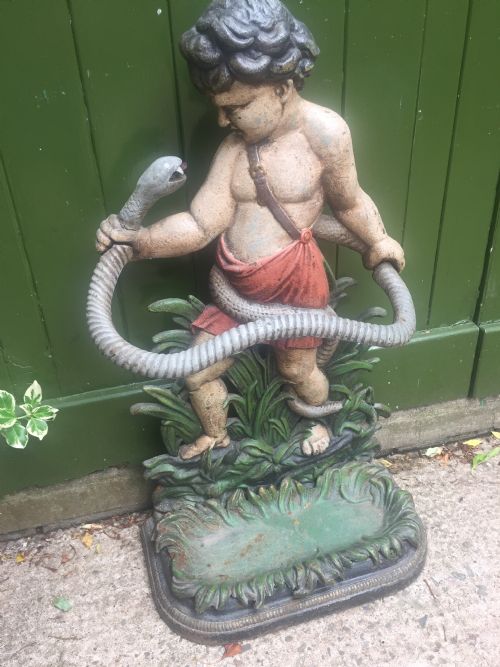 MID C19TH CASTIRON STICKSTAND DEPICTING THE YOUNG HERCULES - ADDITIONAL PHOTO 3