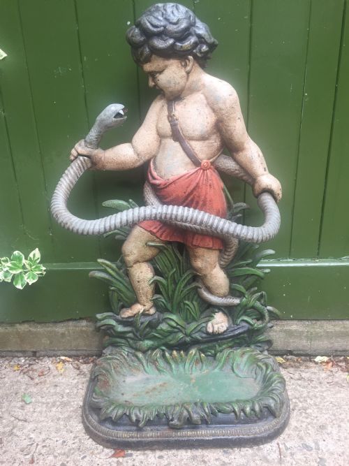MID C19TH CASTIRON STICKSTAND DEPICTING THE YOUNG HERCULES - ADDITIONAL PHOTO 6