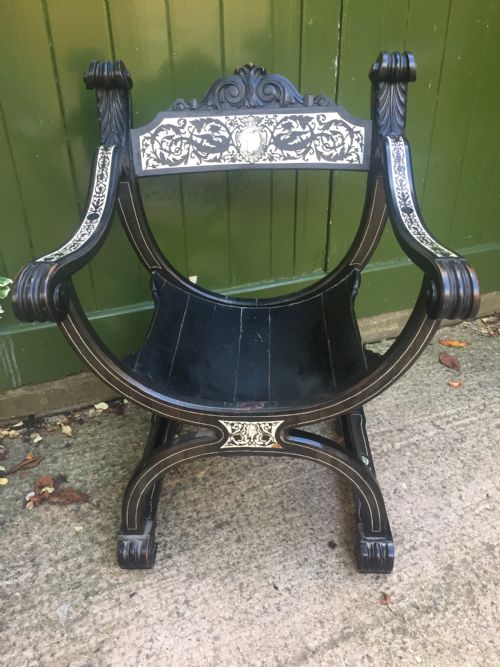 fig 2. C19th Italian ebonised and ivory inlaid 'Savonarola' type armchair of Renaissance style.