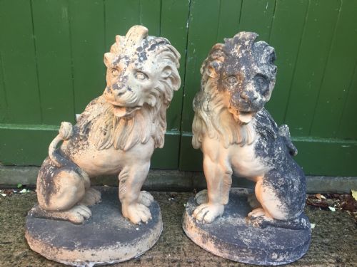 fig 1. Fine and decorative pair of C19th weathered terracotta sitting lions in the C18th anthropomorphic taste.
