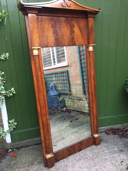 Early C19th Baltic Region Mahogany Framed Pier Mirror with Parcel-gilt Column Caps and Bases .