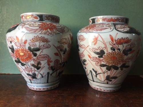Pair of Late C17th / Early C18th Edo Period Japanese Porcelain Vases in the Imari Palette.