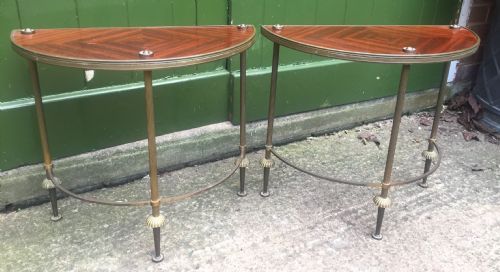 Pair of Early C20th Brass-framed Semi-circular Drinks or End Tables with Quarter-veneered Mahogany Tops.