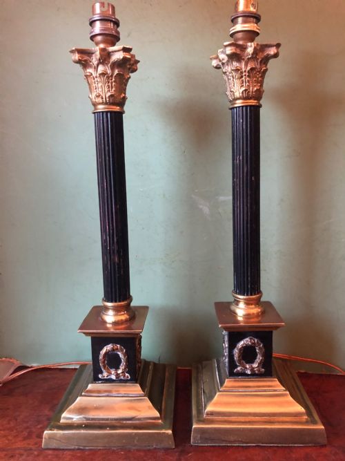 fig 1. Pair of early C20th patinated and polished brass table lamps of classical column form.