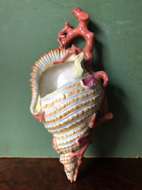 C19th Royal Worcester Porcelain Wall-pocket Modelled as a Sea-shell Wrapped with Coral Branches.