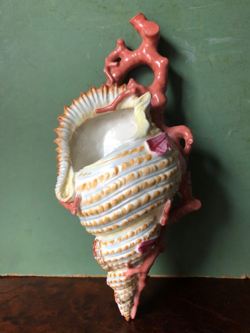 fig 1. C19th Royal Worcester porcelain wall-pocket modelled as a sea-shell wrapped with coral branches.