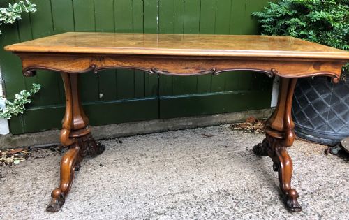 fig 1. Mid C19th early Victorian period carved walnut centre or library table of free-standing form .