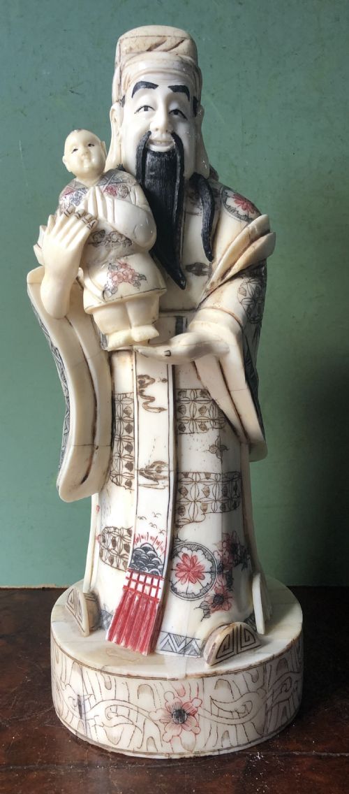 fig 1. Early C20th Japanese carved bone ‘okimono’ figure of an immortal or sage.