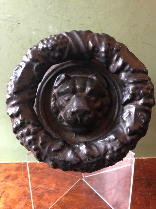 C19th Regency Period Cast-iron Door Knocker Modelled as a Laurel Wreath Ring with a Leopard’s Mask Centre .