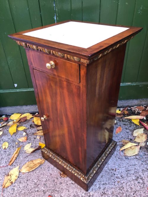 fig 1. Early C19th Italian mahogany and carved parcel-gilt marble-topped pedestal bedside  cupboard.