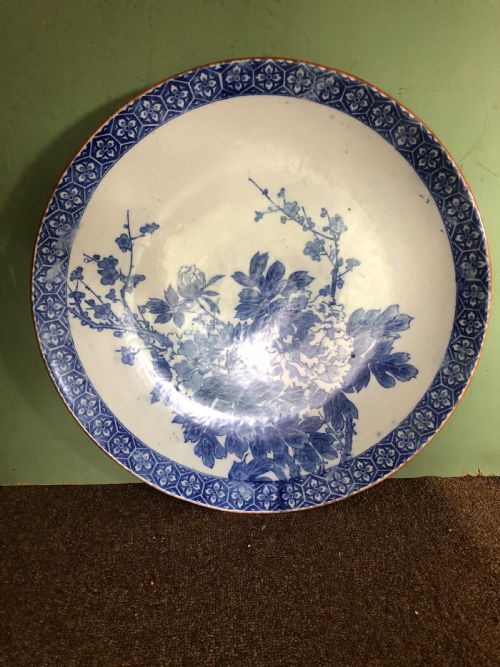 fig 1. Late C19th Japanese Meiji period Arita porcelain charger with blue and white floral decoration.