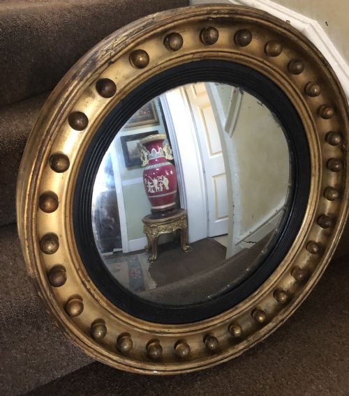 fig 1. Early C19th Regency period gilt-wood framed convex mirror.