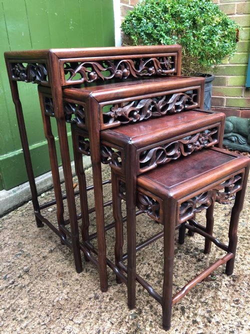 Set of 4 Late C19th/ Early C20th Chinese  Qing Dynasty Carved Hardwood ‘Nesting’ Tables .