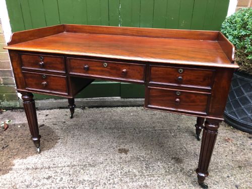 fig 1. Early C19th George IV period mahogany kneehole writing table in the manner of Gillows of Lancaster and London.