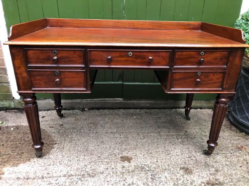 fig 2. Early C19th George IV period mahogany kneehole writing table in the manner of Gillows of Lancaster and London.