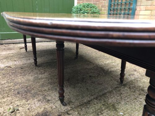 fig 2. Early C19th late George III period mahogany extending dining table of unusual format .