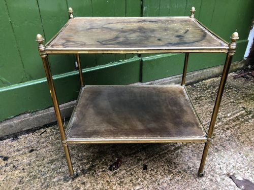 fig 1. Early C20th brass-framed 2-tier rectangular etagere with tooled leather shelves .