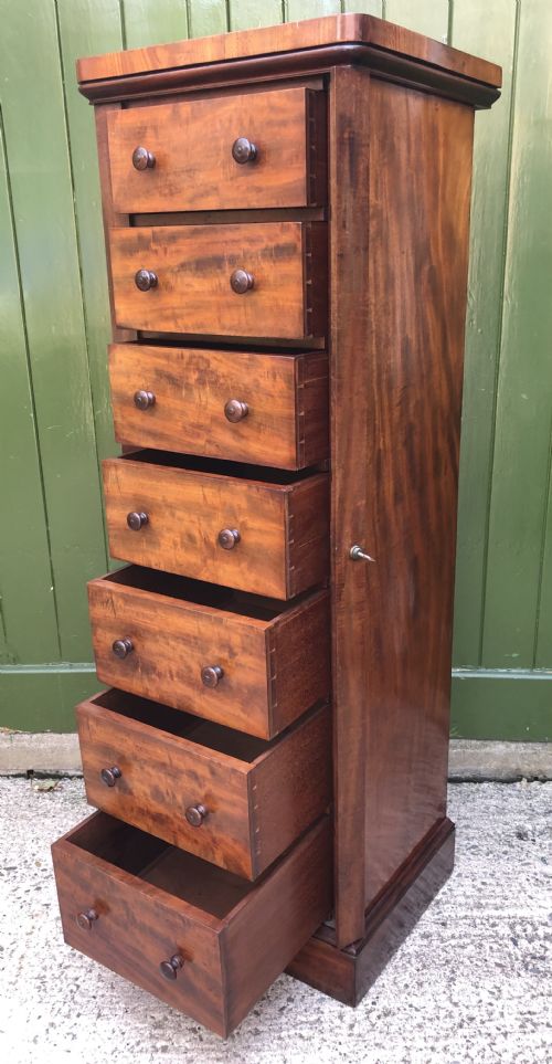 fig 3. Early C19th Regency period mahogany seven-drawer ‘Wellington’ chest .