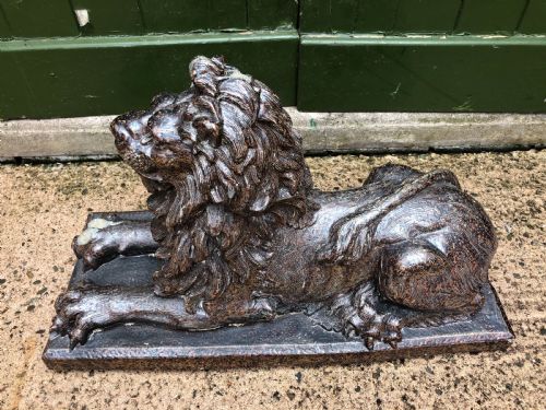 fig 1. Late C19th salt-glaze pottery sculpture of a lion .