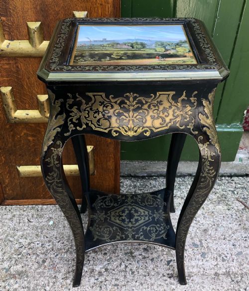 fig 1. Rare early C19th brass marquetry inlaid table the top fitted with a porcelain plaque by Chamberlains of Worcester.