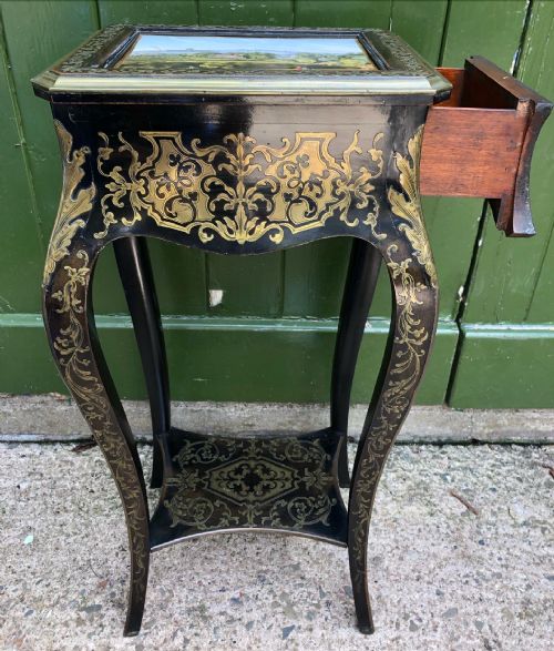 fig 2. Rare early C19th brass marquetry inlaid table the top fitted with a porcelain plaque by Chamberlains of Worcester.