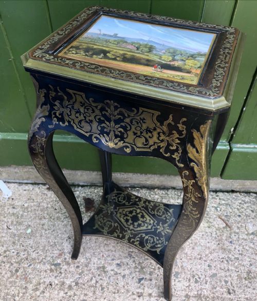 fig 3. Rare early C19th brass marquetry inlaid table the top fitted with a porcelain plaque by Chamberlains of Worcester.