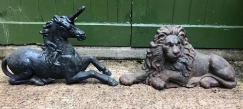 Pair of Mid C19th Cast-iron Boot-scrapers in the Form of a Recumbent Lion and a Unicorn .