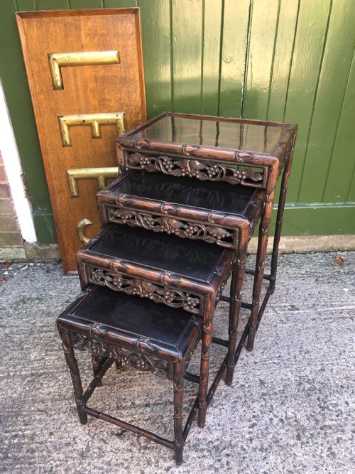 fig 1. Nest of 4 late C19th Chinese Qing Dynasty carved hardwood graduated tables.