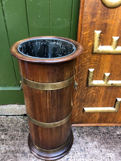 fig 1. Mid C19th brass-banded cylindrical mahogany stick and umbrella stand.