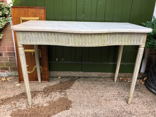 Late C18th / Early C19th Decorated French Serpentine-fronted Console Table with a Carrara Marble Top.