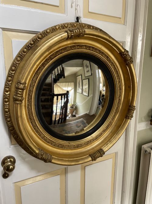 fig 1. Large early C19th Regency period carved gilt-wood frame convex plate mirror 