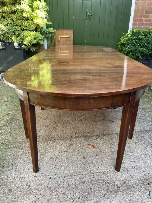 fig 1. Late C18th George III period mahogany d-end dining table of highly versatile format.