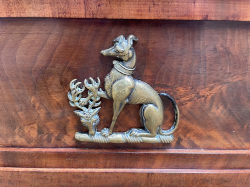 fig 1. Early C19th Regency period brass-mounted mahogany cellarette or wine-cooler of classical sarcophagus form with a noble armorial .