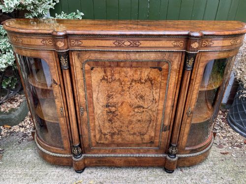 fig 1. Fine quality mid C19th ormolu-mounted burr walnut bow-ended credenza.