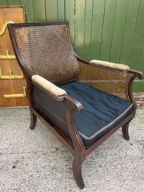 EARLY C19TH REGENCY PERIOD MAHOGANY FRAMED BERGERE LIBRARY ARMCHAIR - ADDITIONAL PHOTO 1