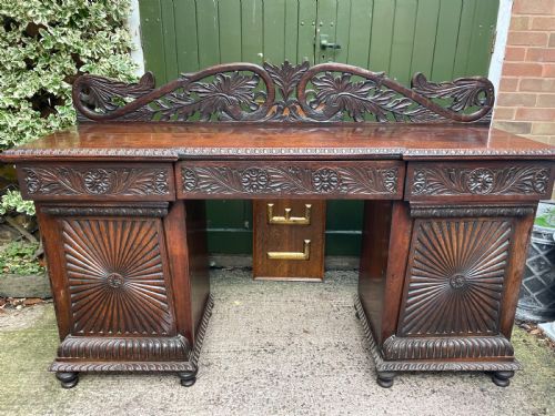 fig 1. C19th Anglo-Indian carved padauk pedestal sideboard.