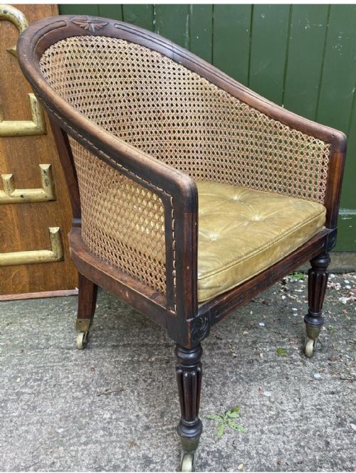 EARLY C19TH REGENCY PERIOD SIMULATED OR FAUX ROSEWOOD FRAMED BERGERE LIBRARY ARMCHAIR - ADDITIONAL PHOTO 2