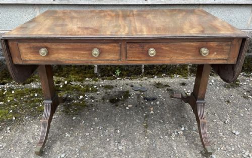 Elegant Early C19th Regency Period Mahogany Sofa Table of Restrained Design.