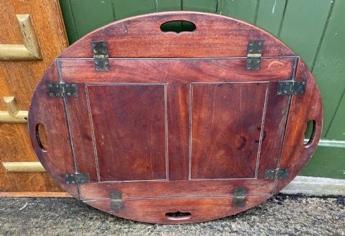 fig 1. Late C18th George III period mahogany oval ‘butler’s’ tray with brass hinged folding sides .