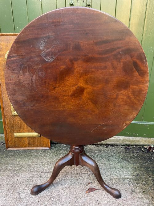 fig 1. C18th George III period mahogany circular ‘snap-top’ tripod base tea table on carved pillar column.