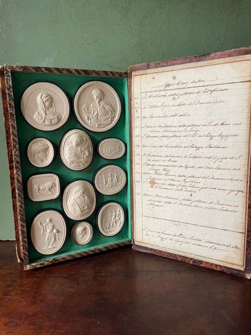 fig 2. Mid C19th Italian ‘Grand Tour’ souvenir double-sided faux book containing a selection of various plaster intaglios by Paoletti.