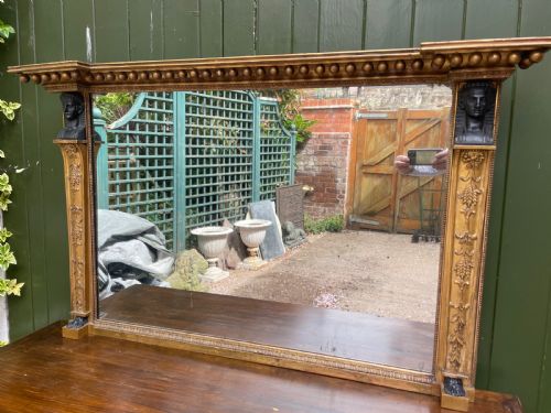 A STYLISH EARLY C19TH REGENCY PERIOD GILTWOOD FRAMED OVERMANTEL MIRROR IN THE FASHIONABLE RETOUR DEGYPTE TASTE OF THE ERA - ADDITIONAL PHOTO 1